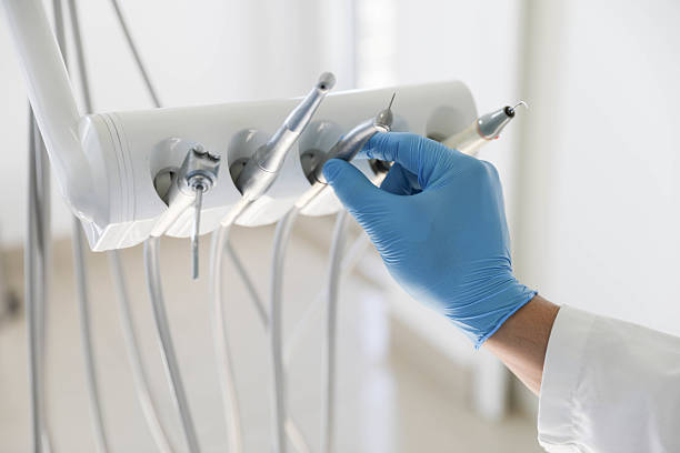 Professional Tooth Extraction technician working in Perquimans County County, NC